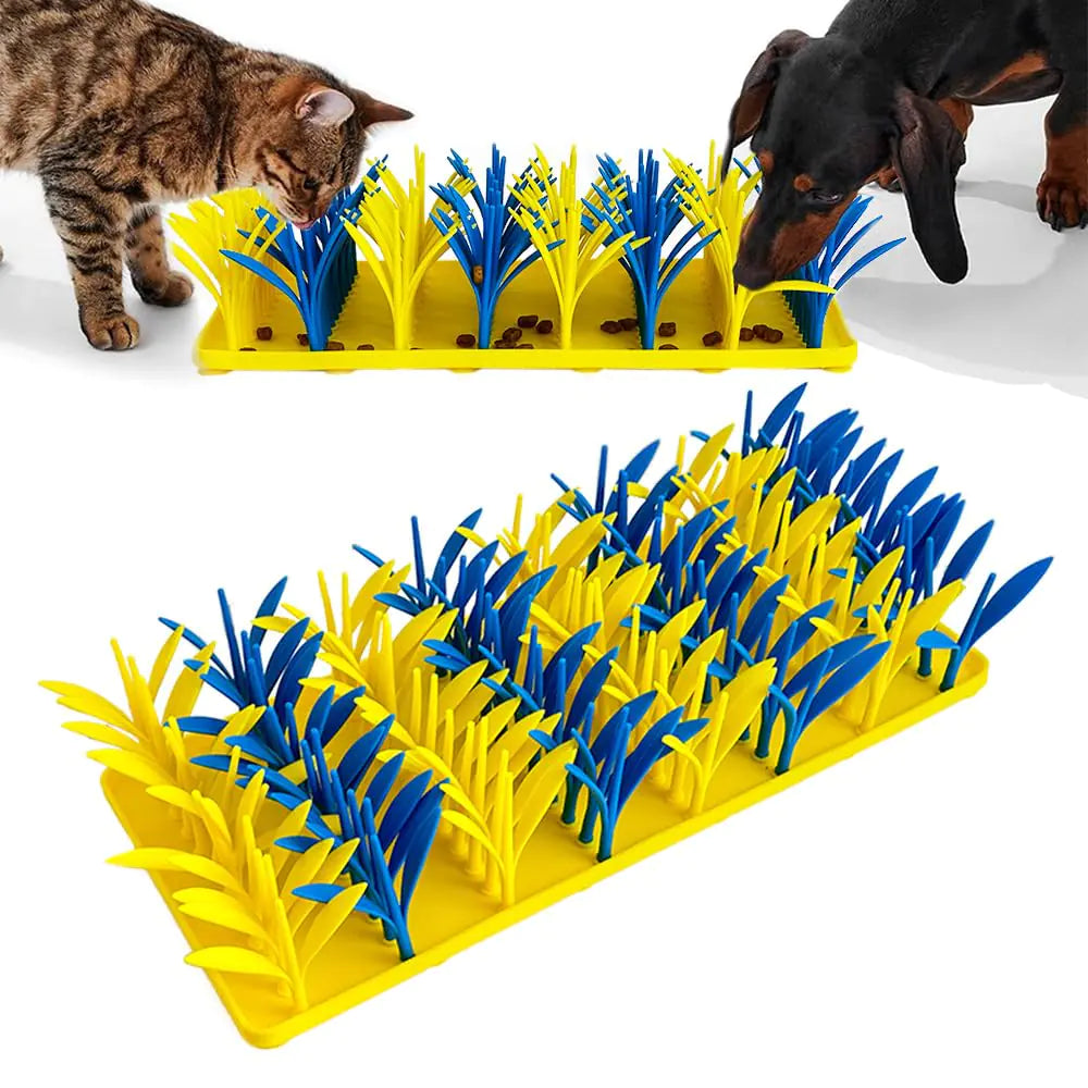 Pet interactive toy, snuffle mat. foraging mat, with a yellow and blue grass-like design, featuring a cat and dog playing with it.