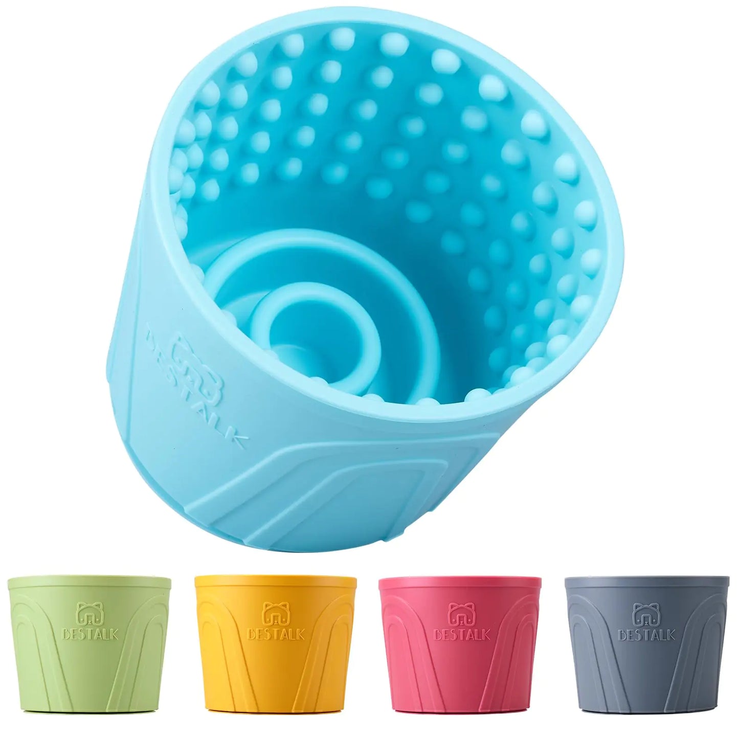 Blue textured lick bowl slow-feeder with four additional colored cups on a white background