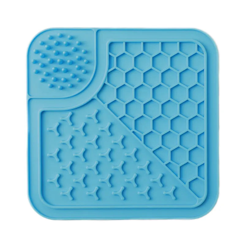 Blue silicone mat with textured surface on a white background