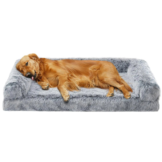 Dog lying on a gray fluffy pet bed against a white background