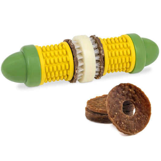 Dog toy with textured surface and brush, accompanied by a treat on a white background