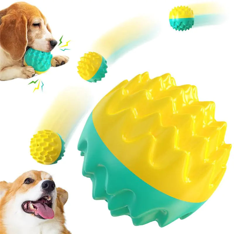 Dog toy with yellow and green textured ball, dog holding it, and another dog looking at it.