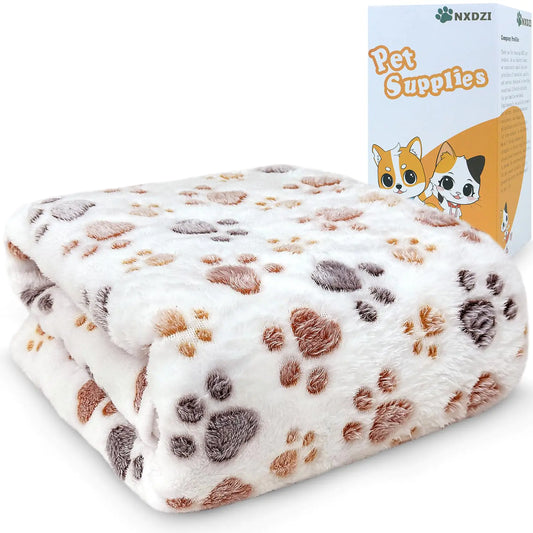 Fluffy pet blanket with paw pattern and NXDZI pet supplies box in the background