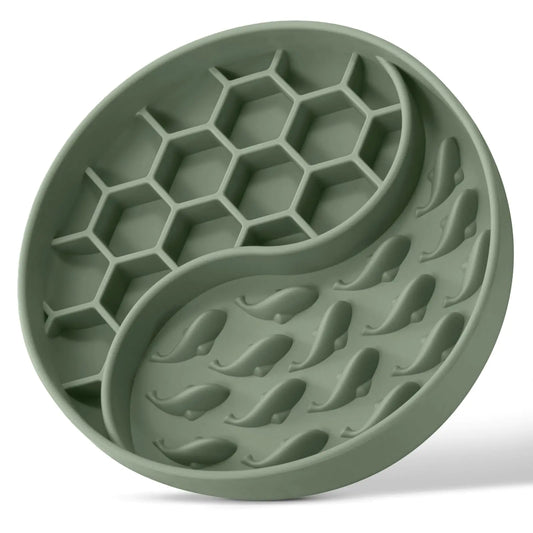 Green silicone mat with honeycomb and wavy patterns on a white background
