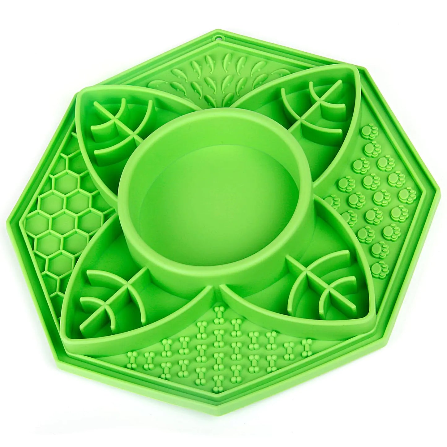 Green silicone slow-feeder lick mat with a central bowl on a white background