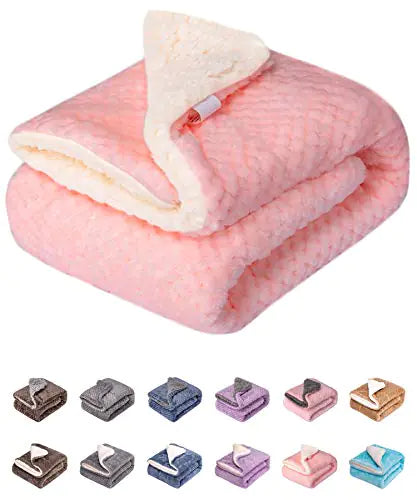 Pink and white blanket with color swatches below on a white background