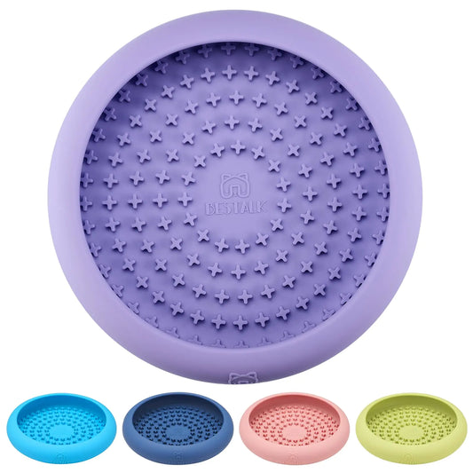 Purple silicone pet lick bowl slow feeder with a textured surface and four smaller color options below on a white background.