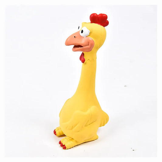 Yellow rubber chicken toy with a red comb on a white background